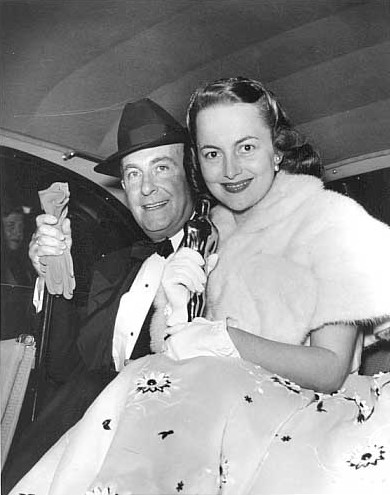Olivia in 1947 posing with Oscar.